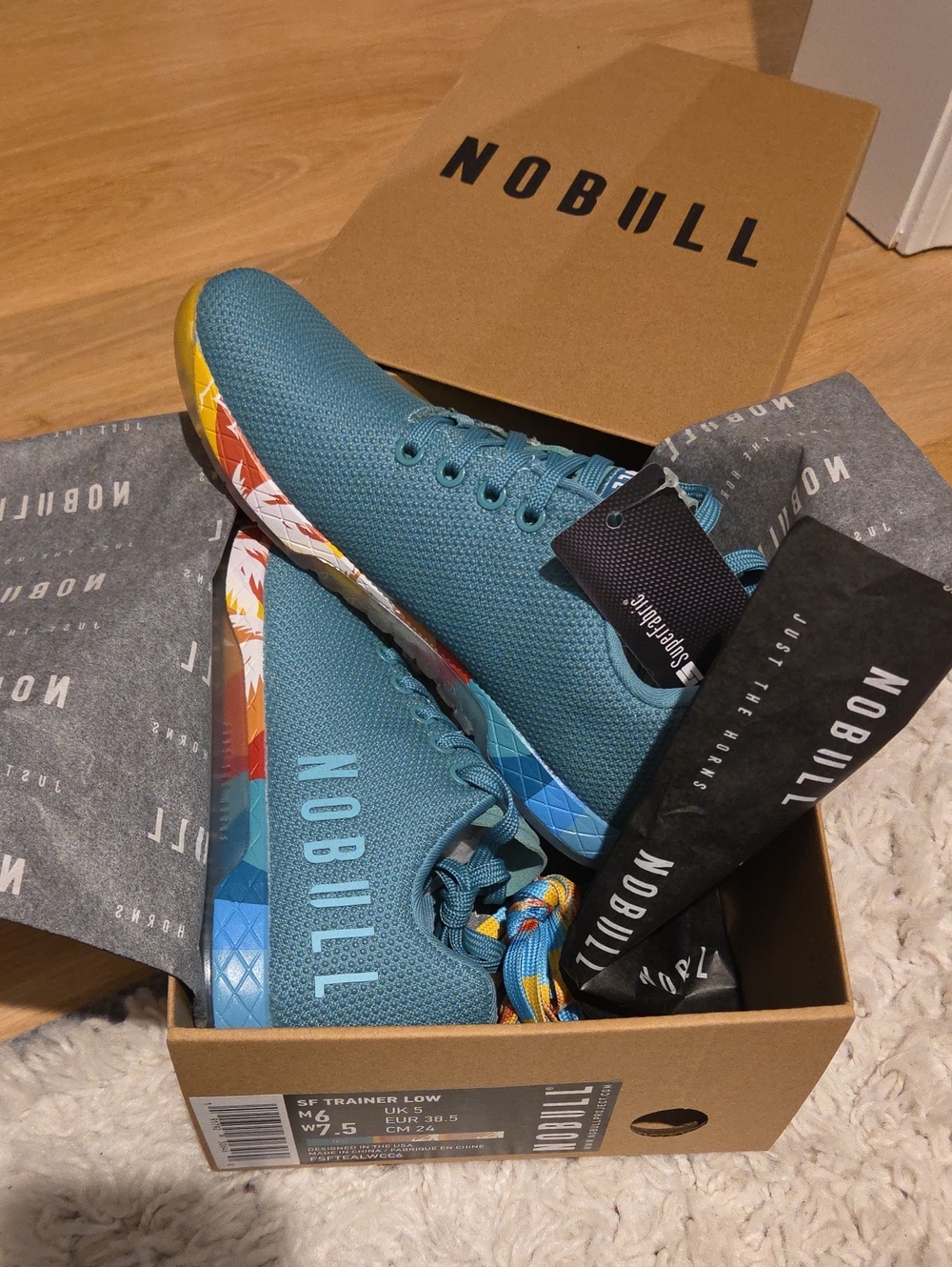 NOBULL Teal Low-Top Trainer with Multicolor Patterned Sole